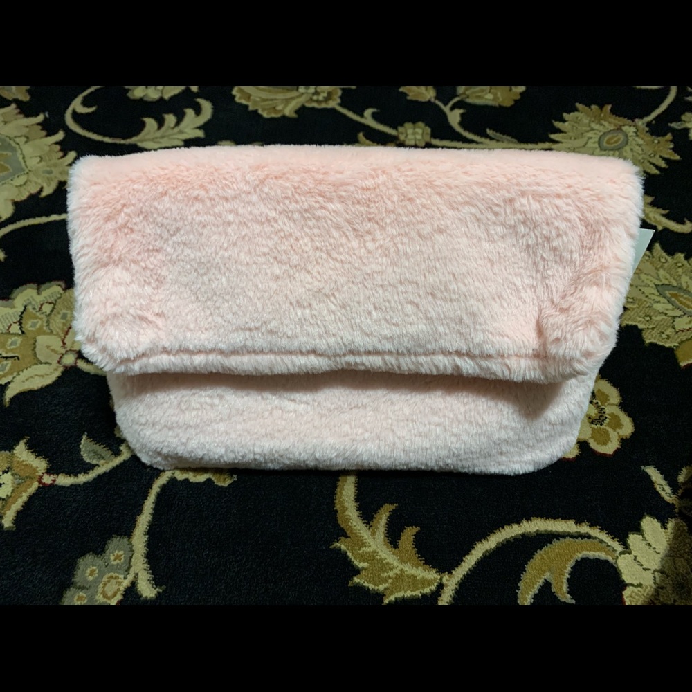 Street Level furry pink clutch bag